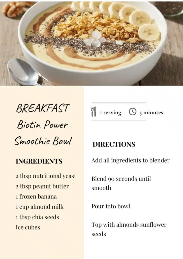 Vegan biotin power smoothie bowl topped with almonds and sunflower seeds, made with nutritional yeast, peanut butter, banana, and almond milk for healthy hair support